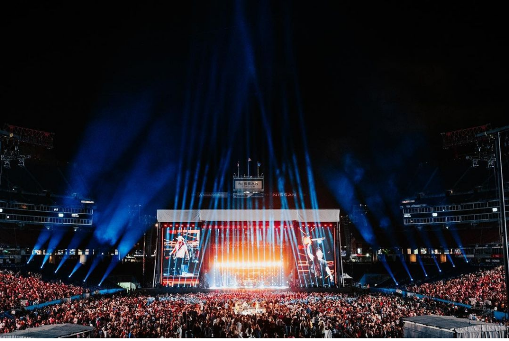 lights shining on stage at Nissan Stadium for CMA Fest 2024! Featuring top Country Music artists.